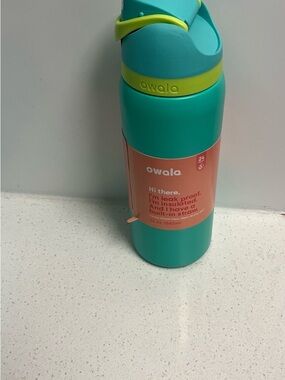 Owala Insulated Water Bottle in Teal with Lime Accent